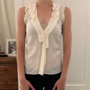 White sleeveless blouse